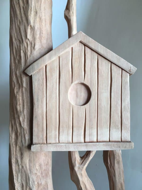 Hand-carved bird house wood door