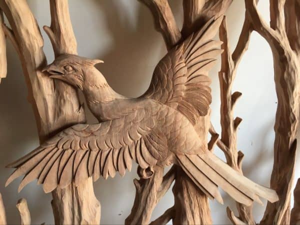 hand-carved pheasant wood door